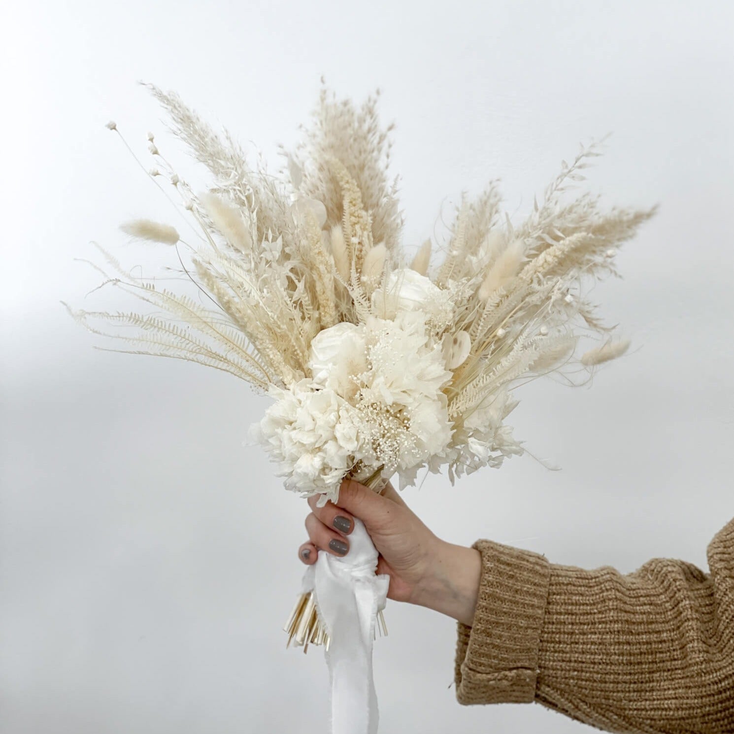 For eternity: A bridal bouquet, timeless beauty in natural tones