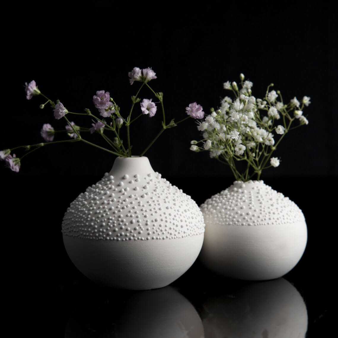 RÄDER Various matte pearl vases: artistic variety in stoneware