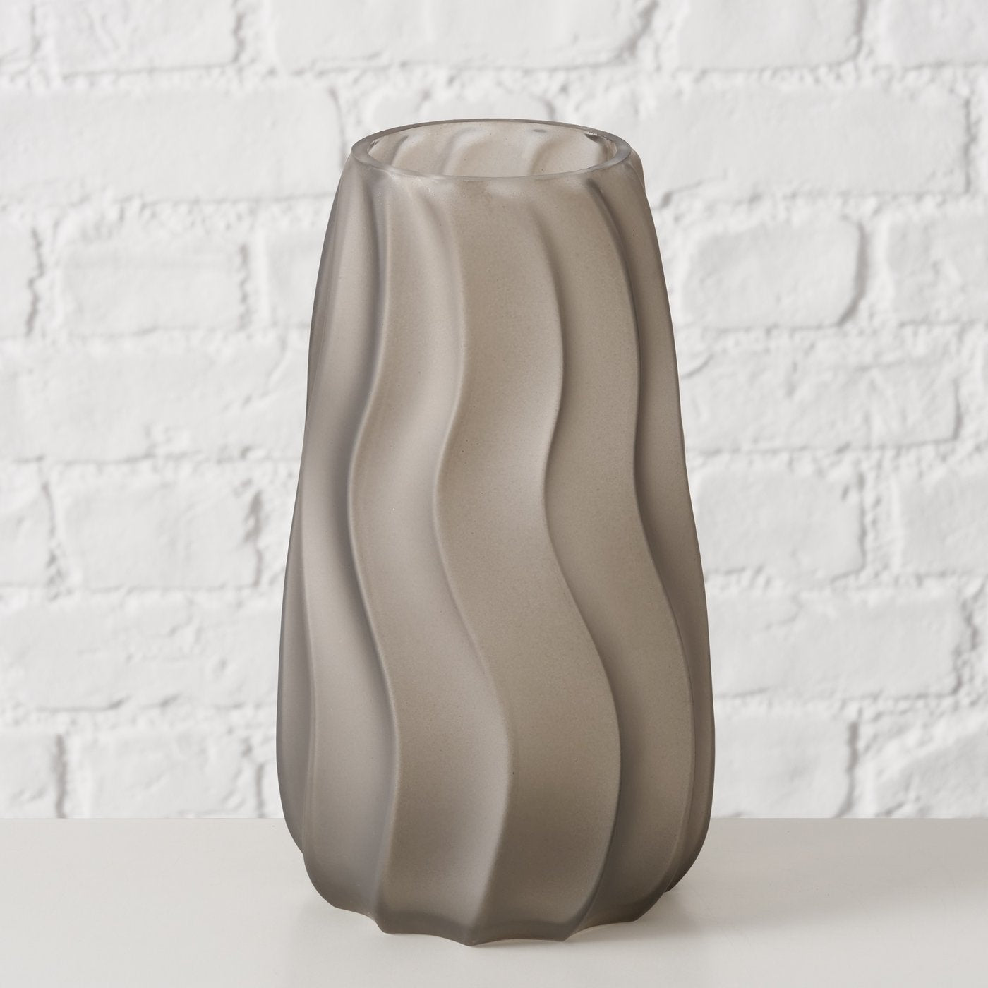 Organic glass vase in matt grey – modern design with a natural shape