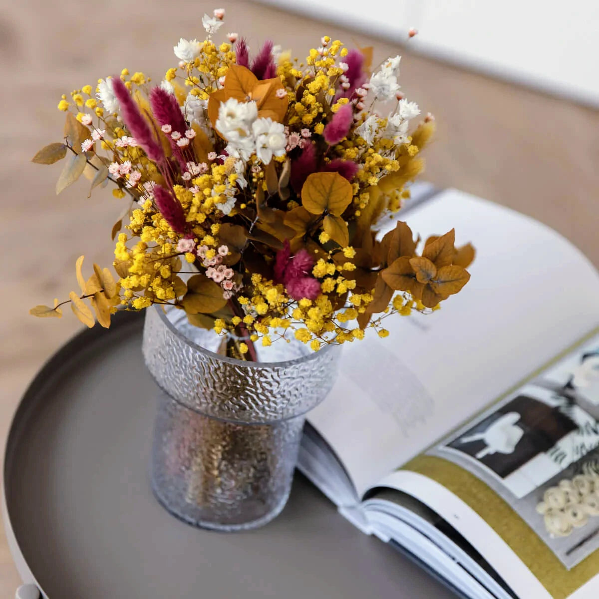 Lively: Yellow eucalyptus and magenta in a dried flower arrangement