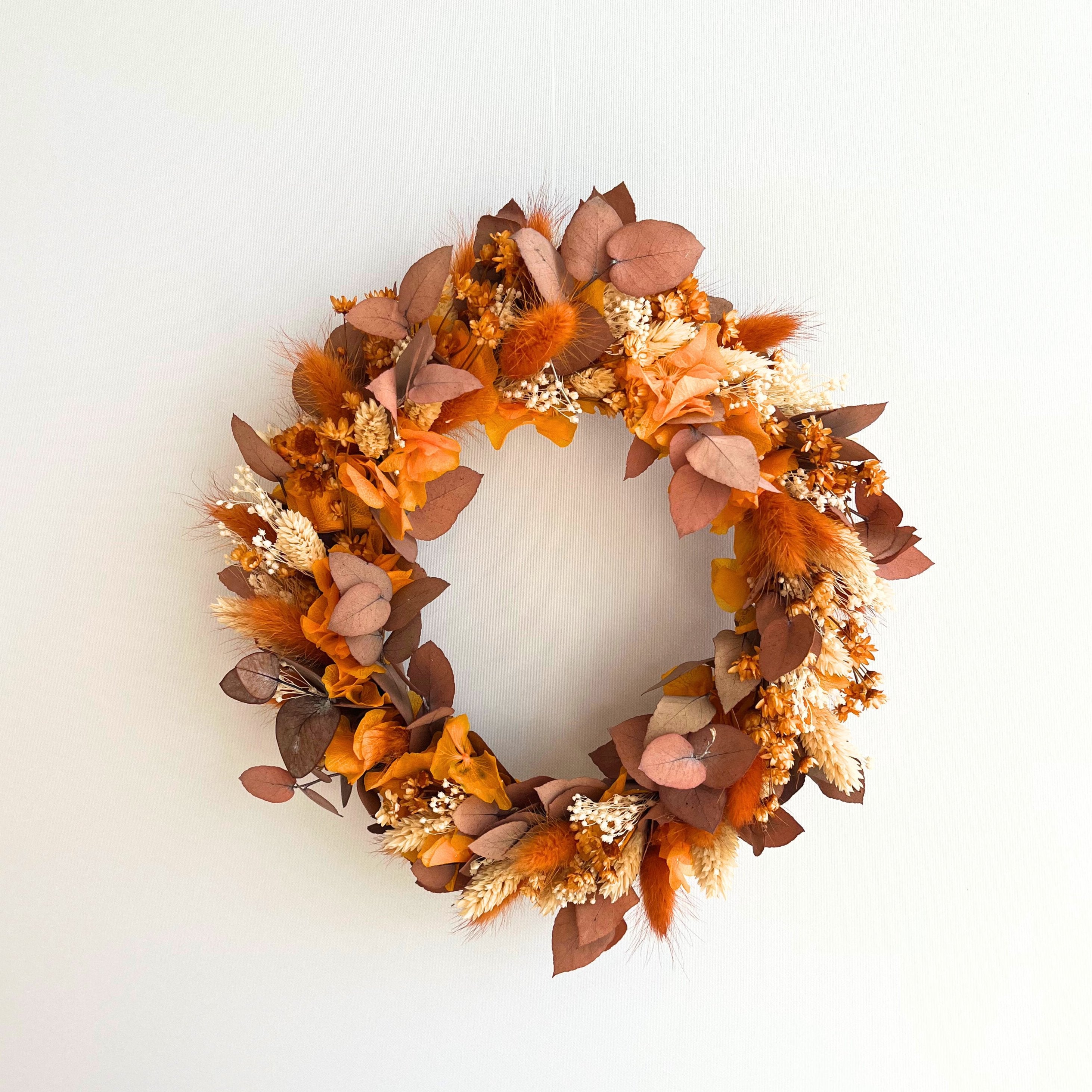 dried flower wreath in autumnal orange